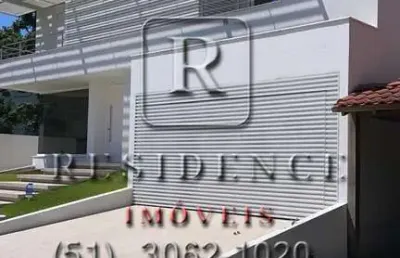 Casa com 3 quartos à venda na rua dos botos, 397, jurerê internacional, florianópolis, 412 m2 por r$ 5.450.000