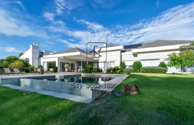 Casa em condomínio fechado com 4 quartos à venda na avenida juca batista, 8000, belém novo, porto alegre, 710 m2 por r$ 7.500.000