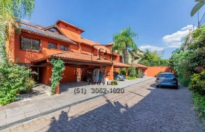 Casa em condomínio fechado com 4 quartos à venda na rua ênio andrade, 320, três figueiras, porto alegre, 650 m2 por r$ 12.199.000