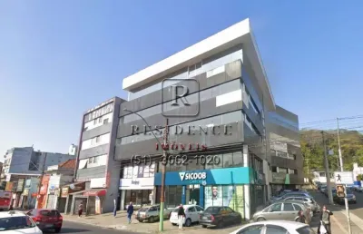 Sala comercial de 154m² em prédio com fachada imponente, recepção e vaga para visitante. aluguel na azenha, porto alegre-rs.