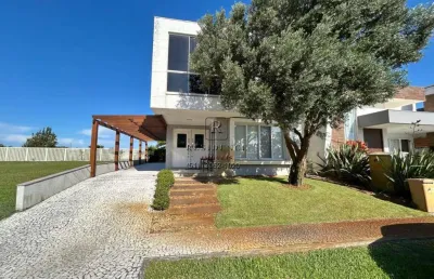Casa de luxo em condomínio à venda em capão da canoa-rs, com 4 quartos, 4 suítes e 210m² de área. confira já!