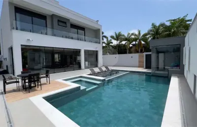 Casa com 4 quartos à venda na Victório Arthur Cavini, Jardim Acapulco, Guarujá