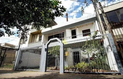 Casa com 3 dormitórios à venda, 253 m² por r$ 1.600.000,00 - rio branco - porto alegre/rs