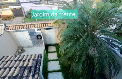 Casa com três suítes de condomínio em campo grande rj.