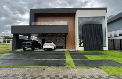 Casa à venda de 460m² | 04 dormitórios, sendo suítes e 04 vagas de garagem | condomínio reserva do paratehy sul - urbanova | são josé dos campos |