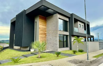 Sobrado à venda de 450m² | 04 dormitórios, sendo suítes e 04 vagas de garagem | condomínio colinas do paratehy sul | são josé dos campos |