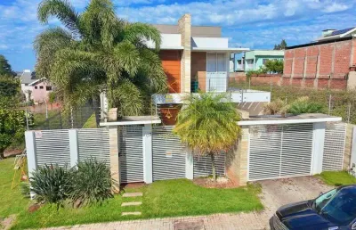 Alto padrão | sobrado com 4 dormitórios, piscina e terreno de 557m²