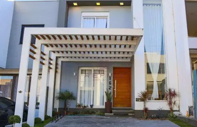 Sobrado com 3 dormitórios à venda, 137 m² por r$ 890.000,00 - primavera - gravataí/rs