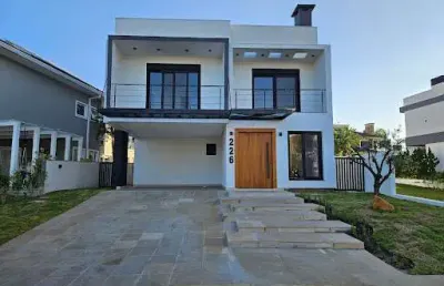 Sobrado com 4 dormitórios à venda, 287 m² por r$ 2.553.000,00 - alphaville - gravataí/rs