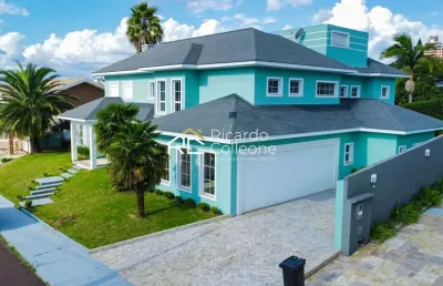 Casa em condomínio fechado, 700m2, 05 suítes, elevador, piscina.