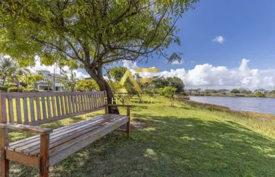 Lote em frente ao lago no condomínio melício machado, aruana (15x30 m²).