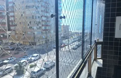 Apartamento de frente com vista liberada na av. central de capão da canoa