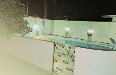 Casa térrea em penha com piscina. permuta por casa em pomerode.
