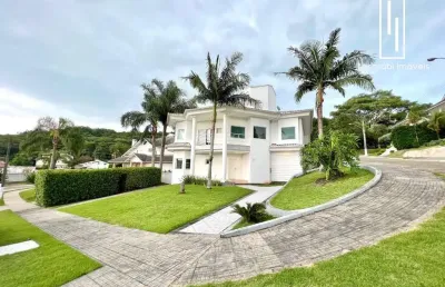 Casa em condomínio fechado com 5 quartos à venda na rodovia haroldo soares glavan, 929, cacupé, florianópolis por r$ 3.700.000
