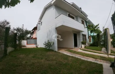 Excelente casa de 3 dormitórios sendo uma suíte bairro guarujá