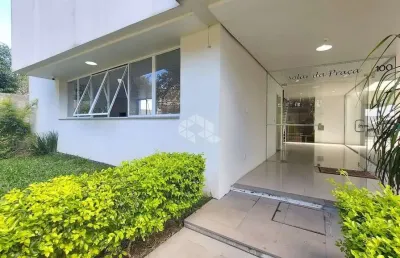 Dois dormitórios com suite duas vagas em frente a praça