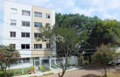 Dois dormitórios com suite duas vagas em frente a praça