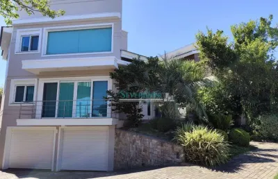 Sobrado com 4 dormitórios à venda, 350 m² por r$ 2.799.000,00 - alphaville - gravataí/rs