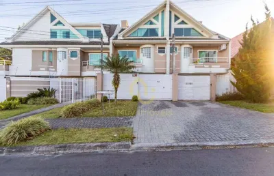 Sobrado triplex à venda no bacacheri – 3 quartos, suíte com hidro, espaço gourmet e 2 vagas.