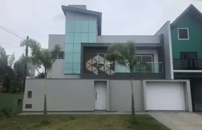 Sobrado alto padrão praia grande, mobiliado, novo e a 800m do mar.