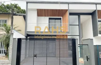 Sobrado geminado de alto padrão no bairro saguacu com 1 suite + 2 demi-suites