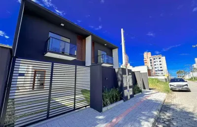 Sobrado com 3 dormitórios à venda, 136 m² por r$ 970.000 - itacolomi - balneário piçarras/sc