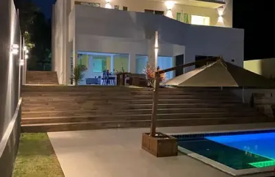 Casa condomínio 4/4 e 3 suítes busca vida estrada do côco