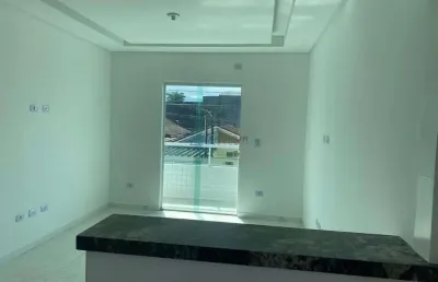 Casa de condomínio sobreposta alta com sacada à venda em praia grande