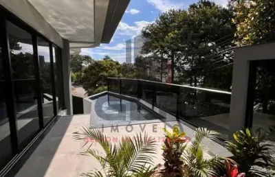 Casa de alto padrão em porto belo/sc com área privativa de 200m² e 348m² de terreno. 3 suítes e piscina com cascata!