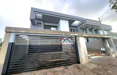 Casa com 3 dormitórios à venda, 290 m² por r$ 2.724.900,00 - moinhos de vento - canoas/rs