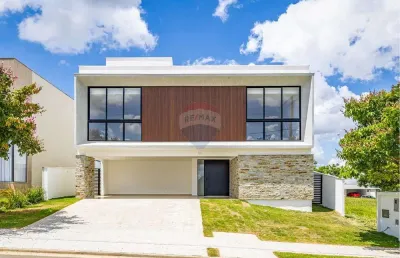 Linda casa com 4 suítes localizada no condomínio alphaville fase 1