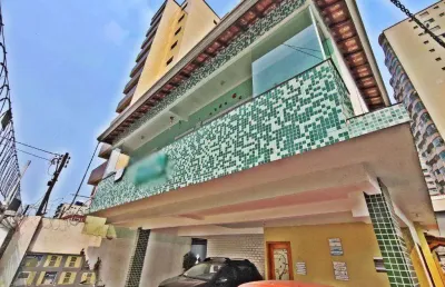 Casa de condomínio à venda em praia grande, tupi, com 2 quartos, 58m²