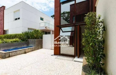 Vende casa de alto padrão em condomínio com 4 suítes e 8 vagas no campo belo.