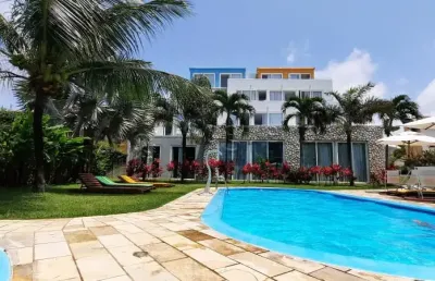 Flat mobiliado e com varanda com excelente localização na beira mar da praia dos carneiros.