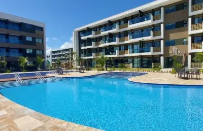 Muro alto: 2 quartos, varanda e  lazer completo para família.