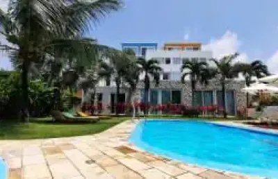 Flat com varanda e vaga na garagem com excelente localização na beira mar de tamandaré