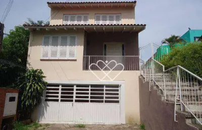 Ampla casa em gravataí com 3 dormitórios e espaço versátil para negócios