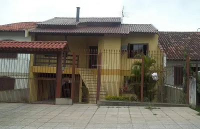 Aluguel de casa comercial de 160m² com ampla garagem em localização estratégica