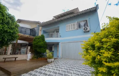 Sobrado com 5 quartos e 3 suítes no bairro barnabé em gravataí com amplo terreno