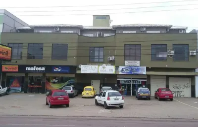 Sala comercial de 60m² com banheiro social para aluguel