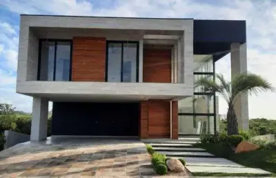 Viva o luxo e conforto em 452m² de puro requinte: 4 suítes e área de lazer completa