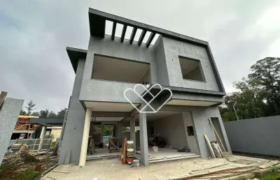 Luxuosa casa na beira do lago no city park: elegância, conforto e natureza em harmonia