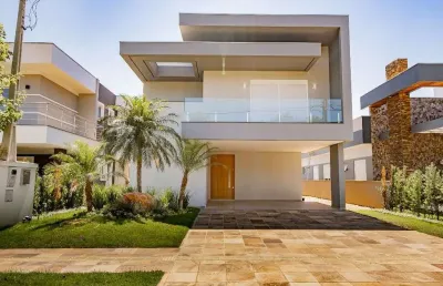Casa de alto padrão com suíte master e home office no alphaville gravataí – sofisticação e conforto em condomínio exclusivo
