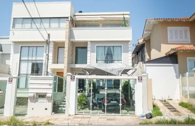 Encante-se com esta casa de alto padrão no bairro reserva dom feliciano!