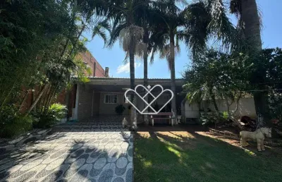 Casa espaciosa e aconchegante: 3 dormitórios, área gourmet e localização privilegiada!