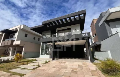 Casa de alto padrão à venda e locação no condomínio city park residence em gravataí