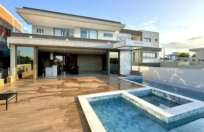 Duplex com  657 m2 construídos, 4 suítes, 3 closets, hidro, área gourmet e piscina no arquipélago de manguinhos