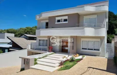 Casa de 4 suítes no condomínio terras de vinhedo – piscina aquecida, área gourmet e privacidade