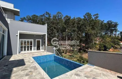 Sobrado á venda no terras de santa teresa - 4 suítes, piscina infinita e vista deslumbrante