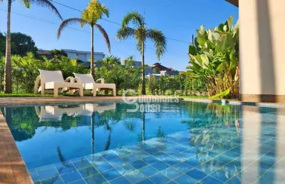 Casa com vista para a mata, 4 suítes e piscina aquecida no condomínio terras de santa teresa